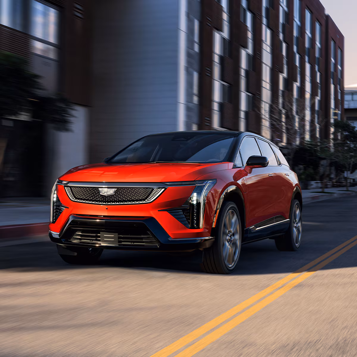 Red 2027 Cadillac OPTIQ luxury electric SUV available at Granby Cadillac